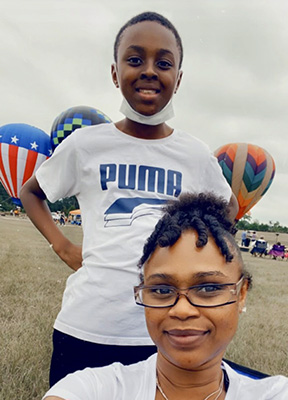 Mother and son at a hot air balloon fair outing 